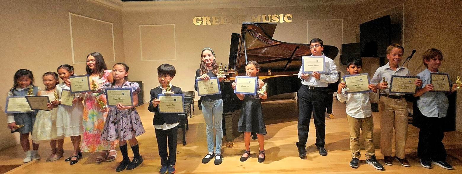 A group of children holding signs

AI-generated content may be incorrect.